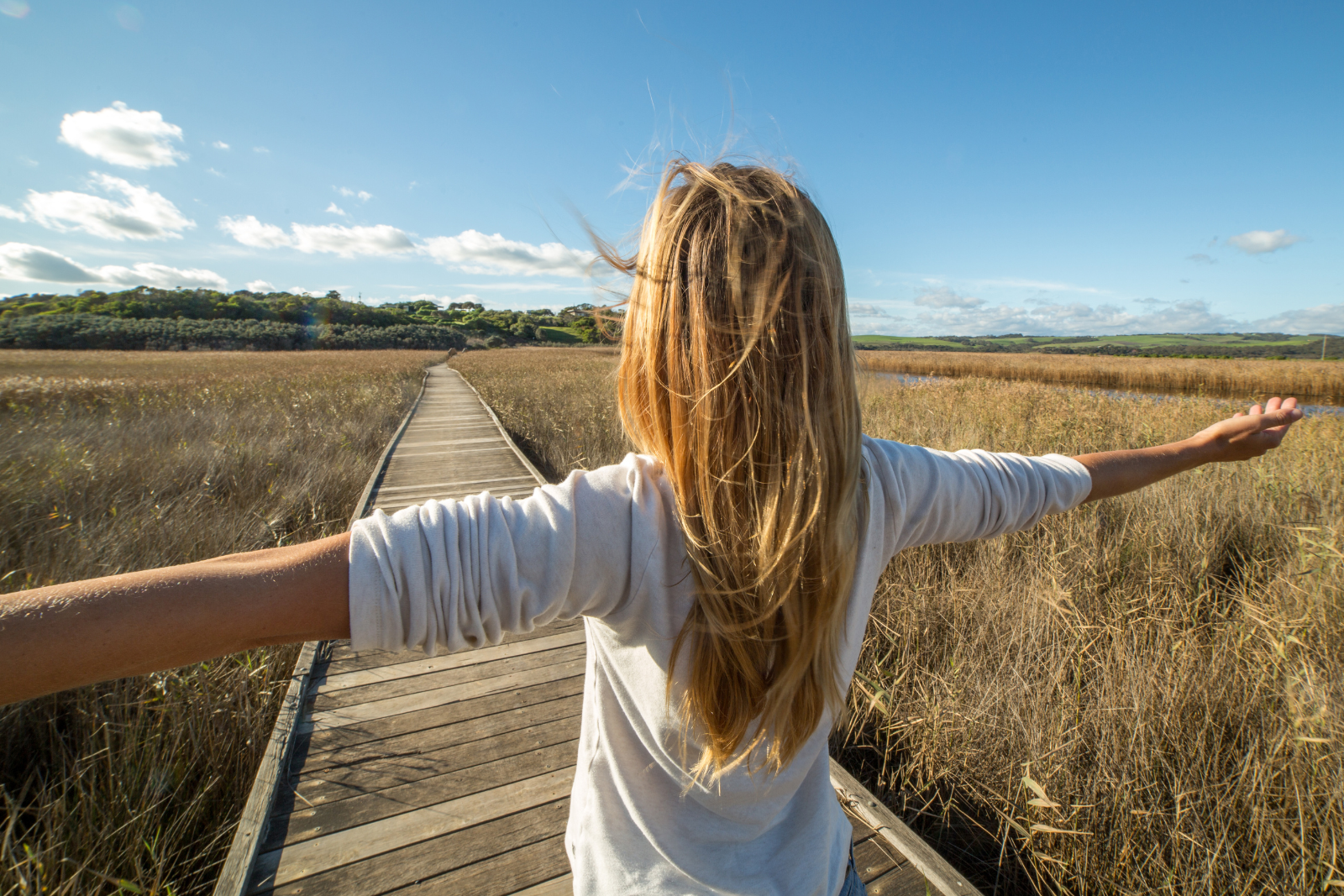 Girl Enjoying the outdoors - promoting community wellbeing